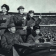 Jiang Qing (left) was wife of Mao Zedong, received the Red Guards in Beijing w/Premier Zhou Enlai (center) & Kang Sheng. All holding the Little Red Book (Quotations from Mao).