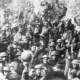 Men of US 64th Regiment, 7th Infantry Division, celebrate the news of the Armistice, 11 November 1918.